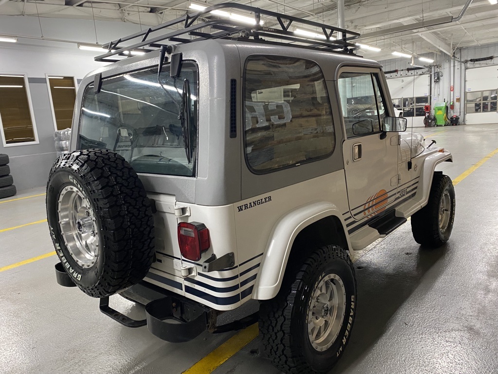 Sold: 1990 Jeep Wrangler Islander YJ