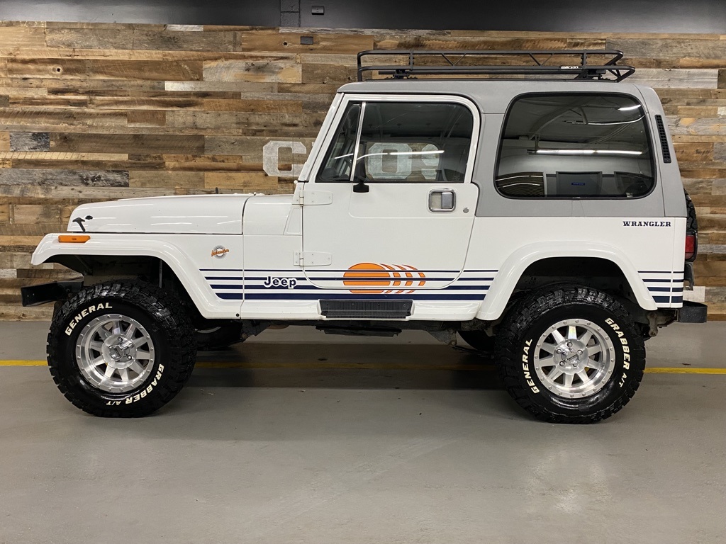 Sold: 1990 Jeep Wrangler Islander YJ